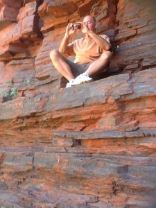 Steve taking a photo before climbing through 'the window' at Kalamina Gorge