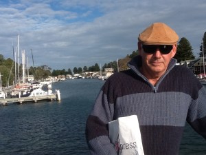 On the foot bridge looking down the river port